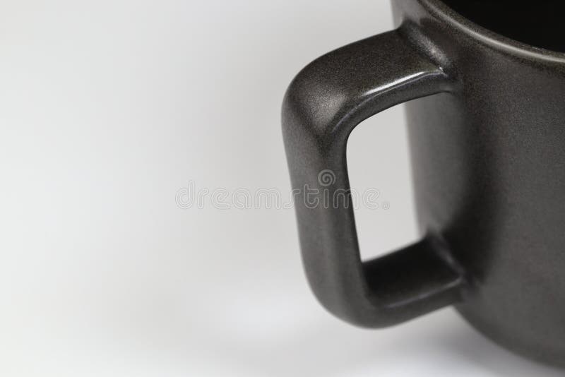 Close Up Black Ceramic Cup Handle with White Background Stock Image