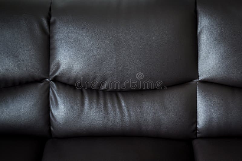 Close Up Black Leather Sofa And Textured And Background Stock Image