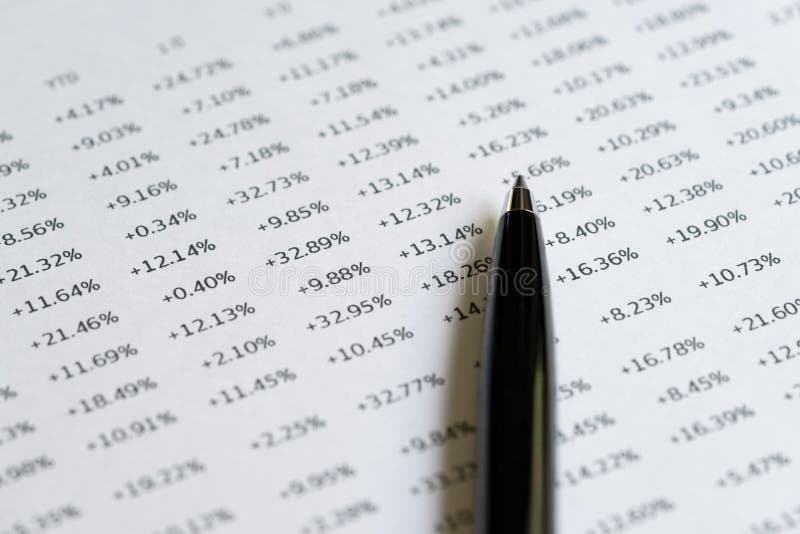 Close up of black pen on nuber or percentage yield of financial