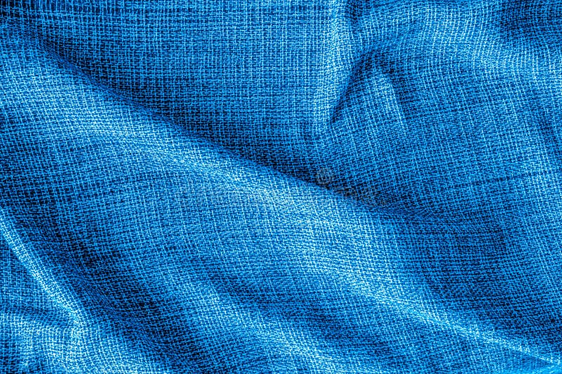 Close-up of blue cotton fabric. Texture and weave detail royalty free stock photo