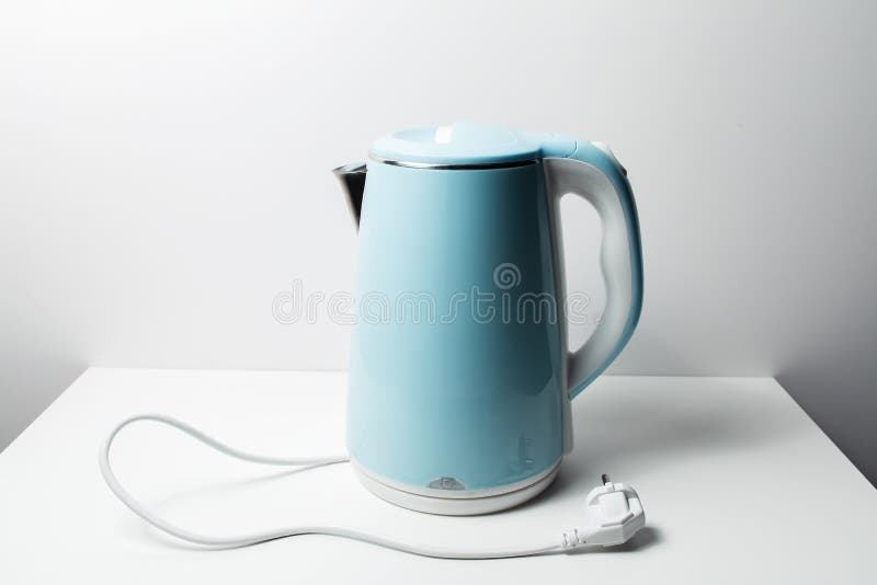 https://thumbs.dreamstime.com/b/close-up-blue-electric-kettle-table-white-background-242857817.jpg