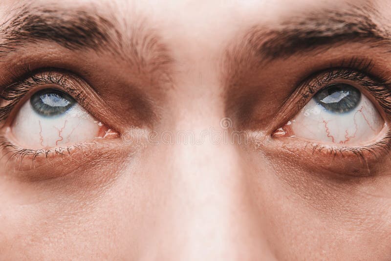 Close-up Shot Of Man's Eye. Man With Blue Eyes. Stock Photo