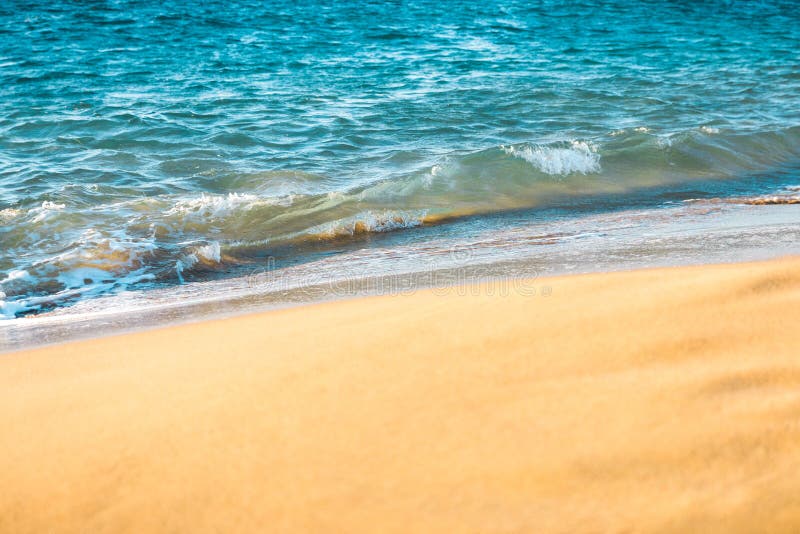 Close Up Blue Sea Water Coming on the Clean Beach Sand Stock Image