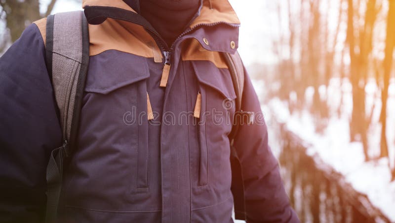 Close up of body in jacket outdoors