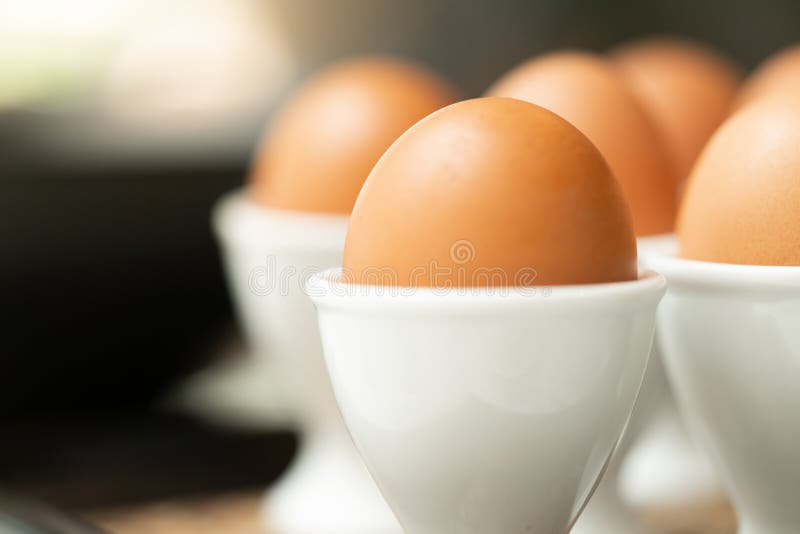 Close up boiled egg in egg cup