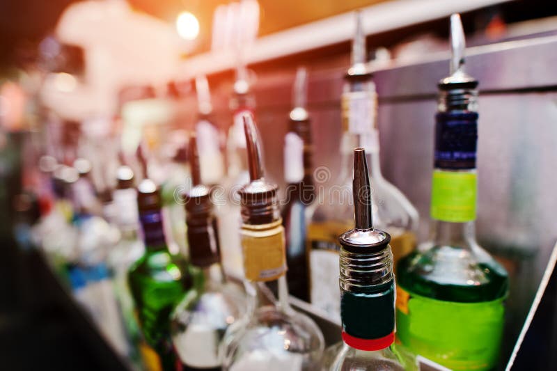 Close up bottles of alcohol and liquor at the bar