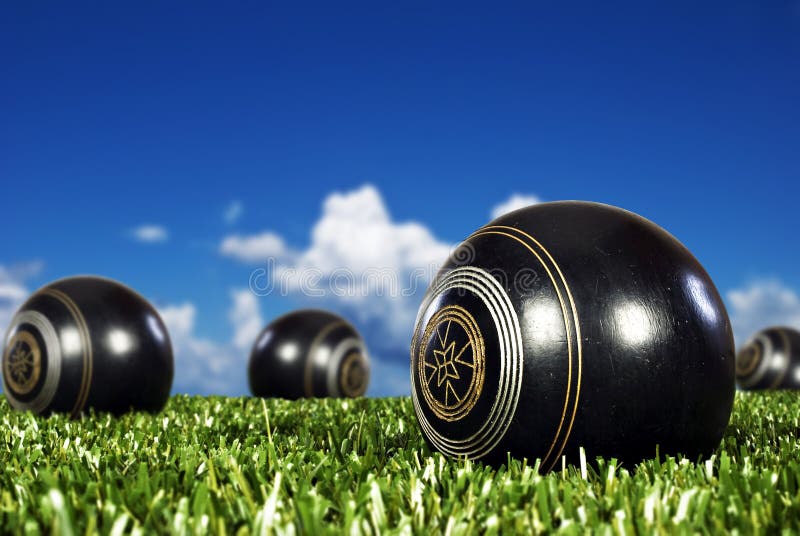 Close up of bowling balls on a bowling field