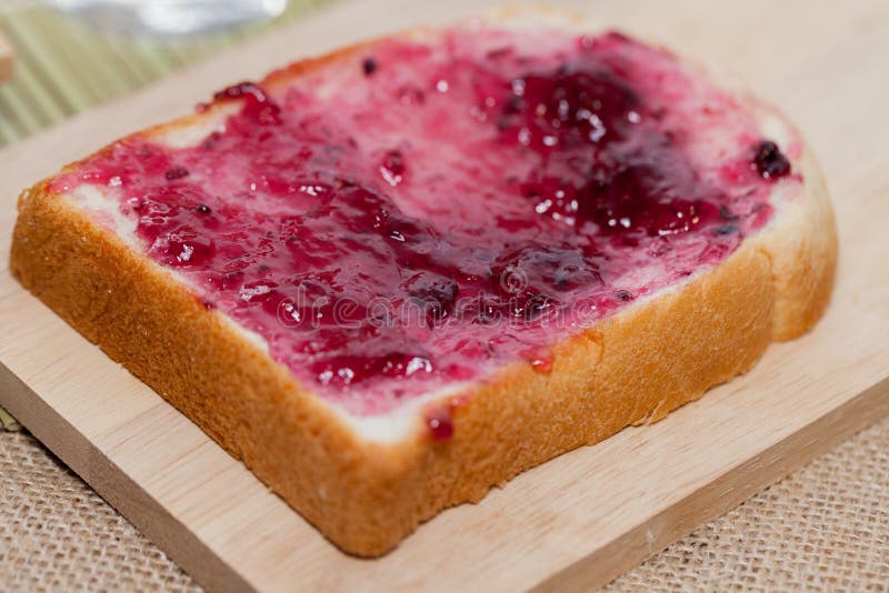 Bread with blueberry jam stock image. Image of food 106389345