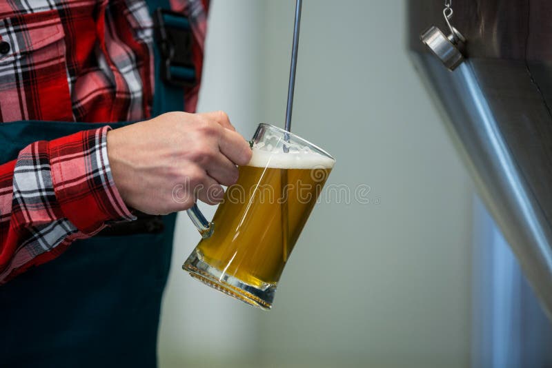 Closeup of Brewer Testing Beer Stock Image Image of machine