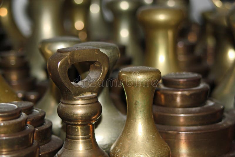 Closeup of bronze weights stock photo. Image of weights 45484058