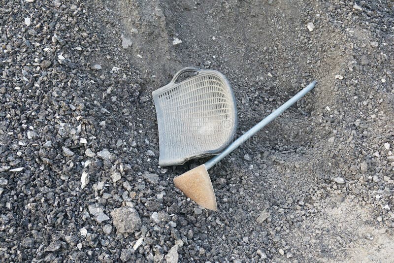 Bucket and stones in construction side royalty free stock photos