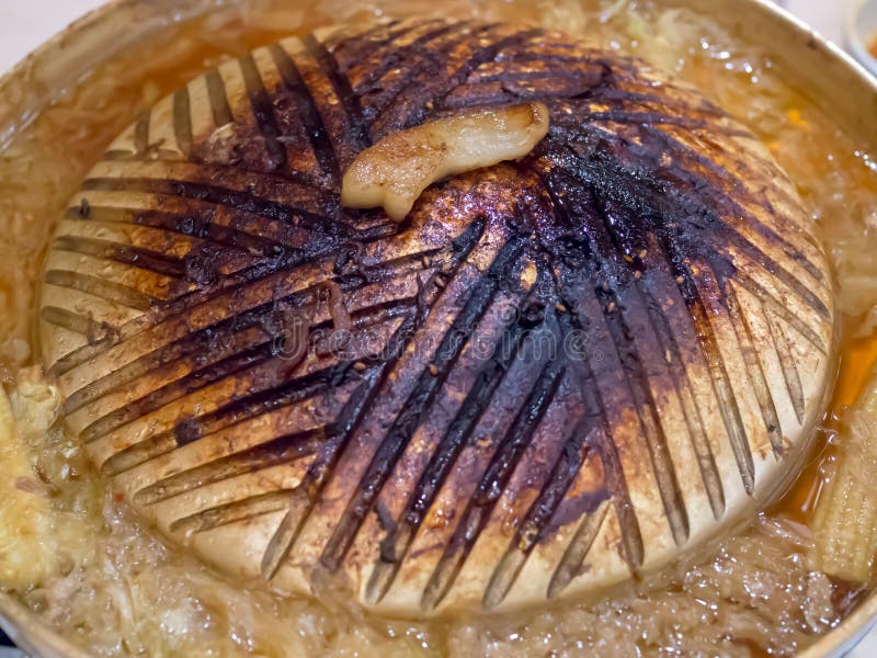 Close up of burned girll gold pork pan of Thailand is burning.It`s not good for health cause of carcinogenic and cancer and dirty stock photo Close up of burned girll gold pork pan of Thailand is burning.It`s not good for health cause of carcinogenic and cancer and dirty stock photo