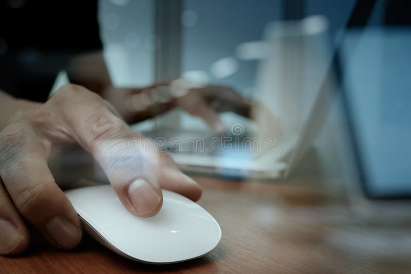 Close up of business man hand working on laptop computer stock photography
