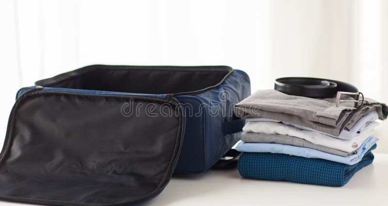 Close up of business travel bag and clothes