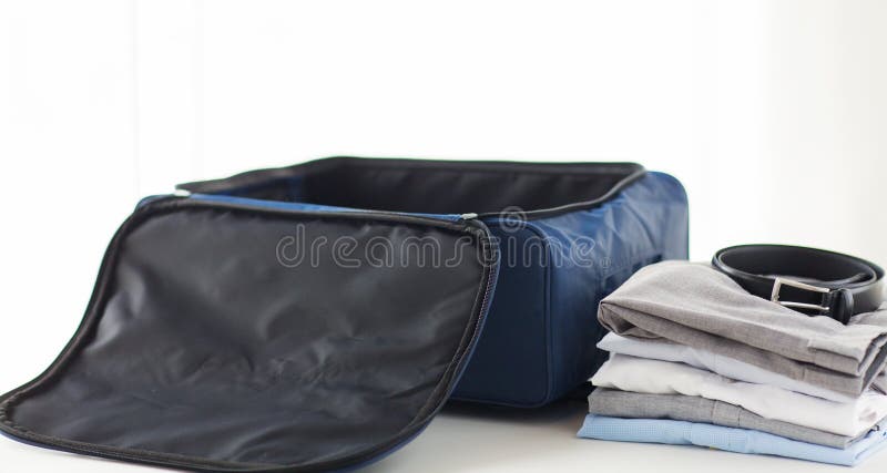 Close up of business travel bag and clothes