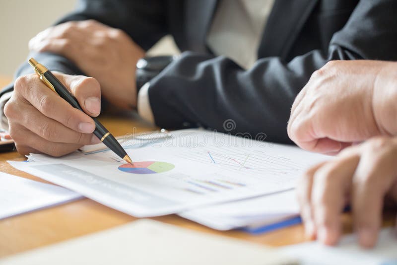 Close up of business woman hand working with financial business graph information, analyzing investment charts royalty free stock photo Close up of business woman hand working with financial business graph information, analyzing investment charts royalty free stock photo