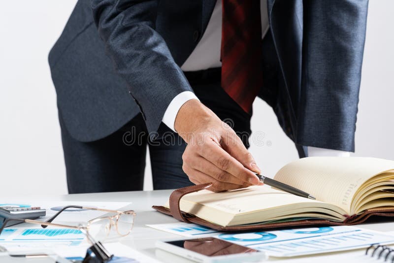 Close-up businessman hand writing to do list royalty free stock images Close-up businessman hand writing to do list royalty free stock images