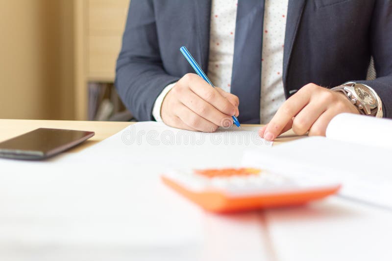Close up businessman signing documents. Business man signing contract making a deal, classic business. royalty free stock image Close up businessman signing documents. Business man signing contract making a deal, classic business. royalty free stock image