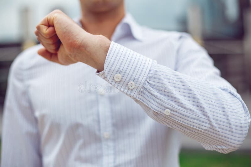 Close Up Of A Businessman In A White Shirt And Shows The Sleeve Stock ...