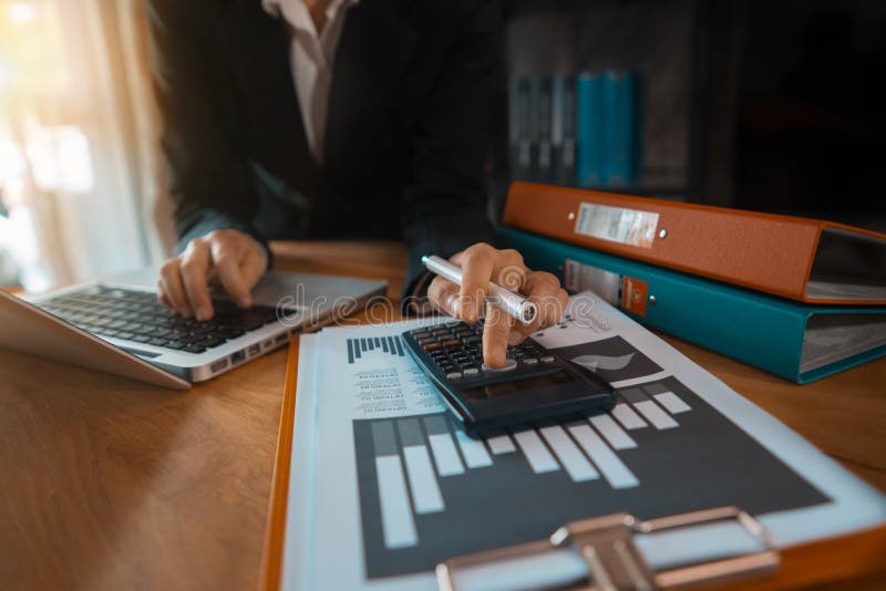 Close up of businessman working on calculator to calculate financial. stock photography Close up of businessman working on calculator to calculate financial. stock photography