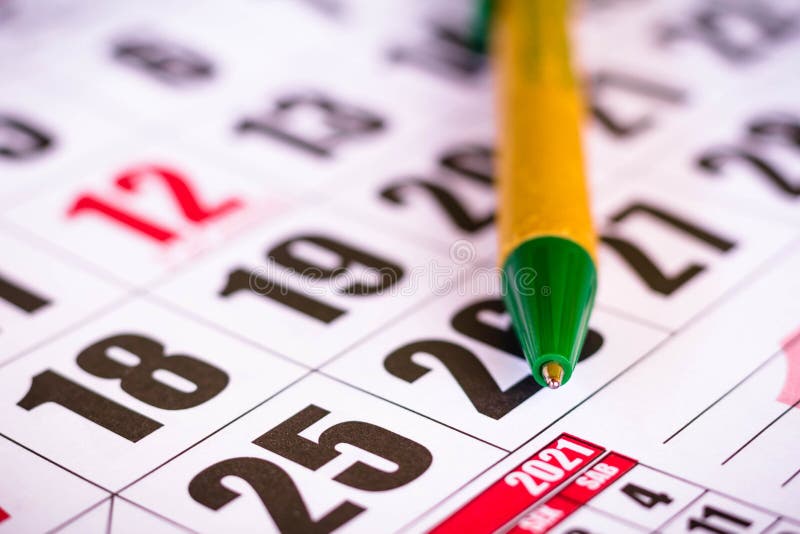 Close Up on Calendar Numbers Concept of Tax Rate, Expiration Date and