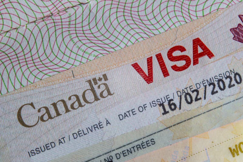 A Close up of a Canada VISA on a passport inside page.  royalty free stock image