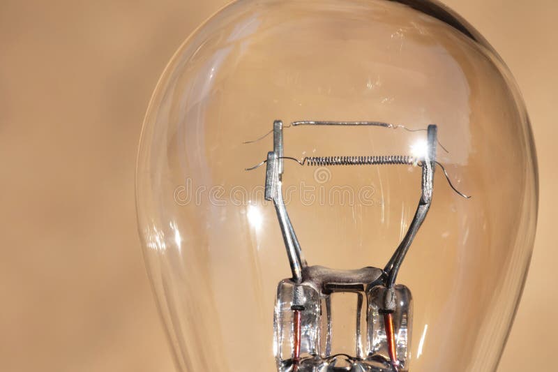 Closeup of a Car Lamp. Filament Bulb for Side Lights and Headlights
