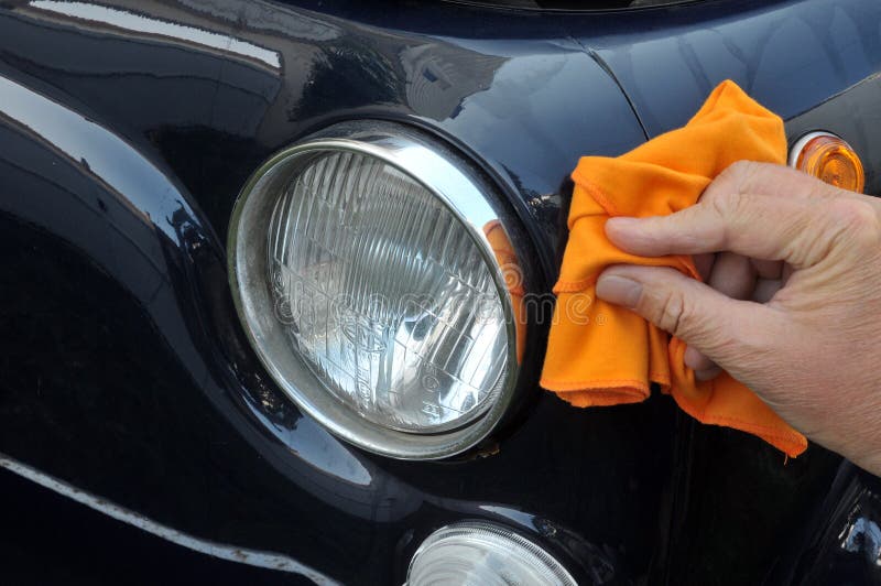 Clean a car with a cloth stock image. Image of clean 138487167