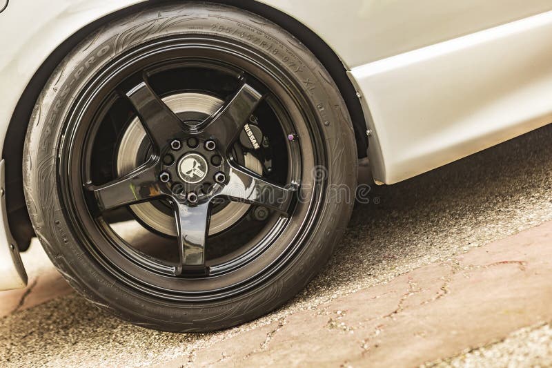 Close Up of a Car Tire on the Ground royalty free stock photography