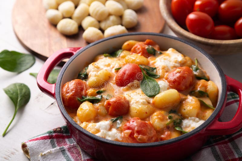 Close Up of a Casserole of Gnocchi in Creamy Tomato Sauce with Baby
