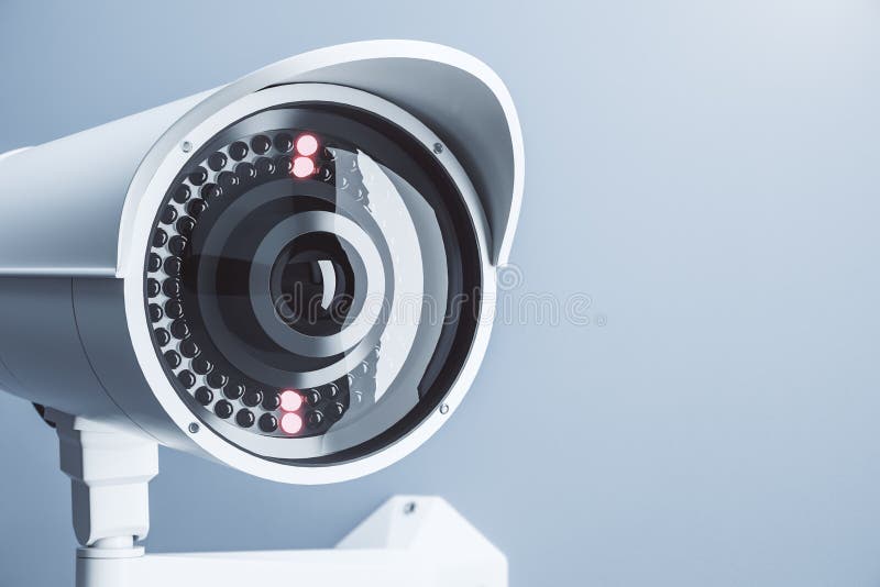 Close Up of Cctv Camera on Light Blue Background with Mock Up Place for