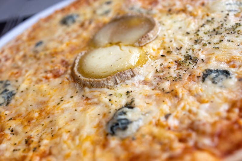 Close up of cheesy pizza in a Spanish restaurant stock photos