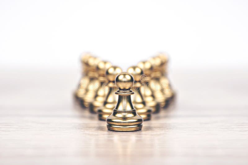 Close-up chess standing first in line teamwork v shape on chess board concepts challenge stock photography