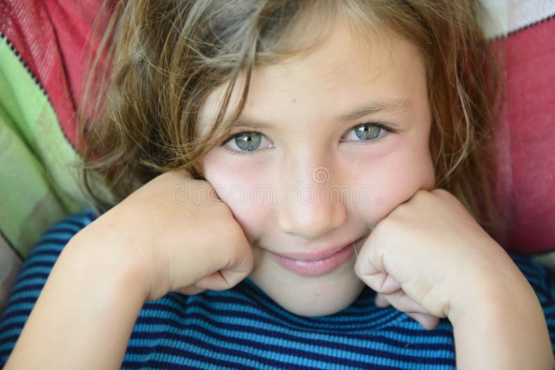 Close-up of a child face smiling