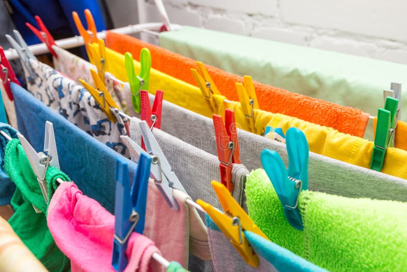 Close up clothes dryer and plastic clips stock photo