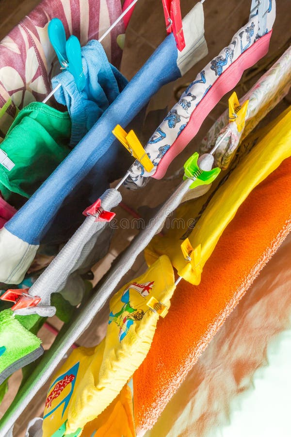 Close up clothes dryer and plastic clips royalty free stock image