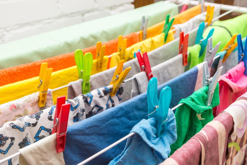 Close up clothes dryer and plastic clips royalty free stock image