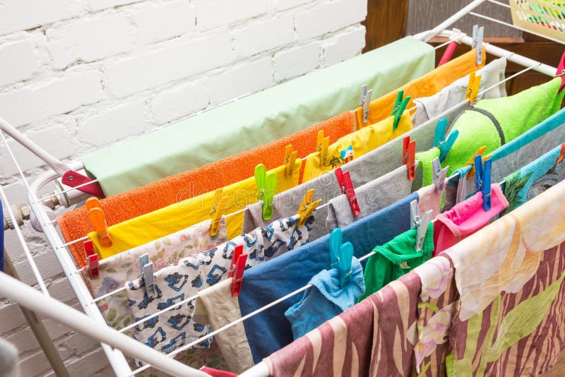 Close up clothes dryer and plastic clips stock photo
