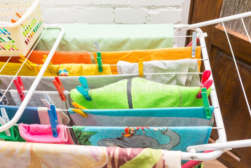 Close up clothes dryer and plastic clips stock images