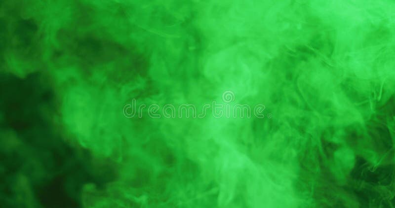 Close up of clouds of green smoke with copy space background. Bright colour and abstract pattern concept digitally generated image.