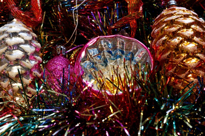 Vintage Christmas tree decorations on a bed of glitter stock photo Vintage Christmas tree decorations on a bed of glitter stock photo