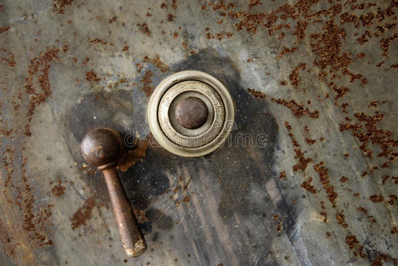 Combination dial on rusted old safe