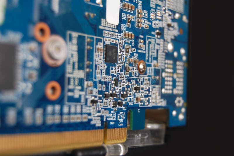 Close-up of a Computer Graphics Card High Tech. A close up of a computer graphics card and the electric components royalty free stock images Close-up of a Computer Graphics Card High Tech. A close up of a computer graphics card and the electric components royalty free stock images