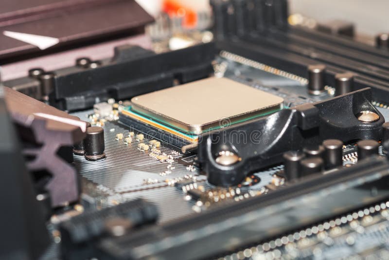 Close-up of computer motherboard and processor components , modern technology. Versatile use