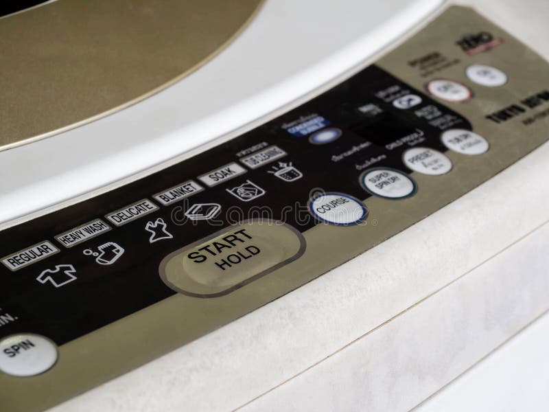 Close up of control panel at front of top loading washing machine. Automatic loading stock images, royalty-free photos and pictures