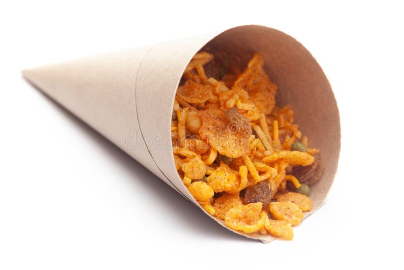 Close up of corn flex mixture Indian namkeen snacks In handmade  handcraft  brown paper cone bag