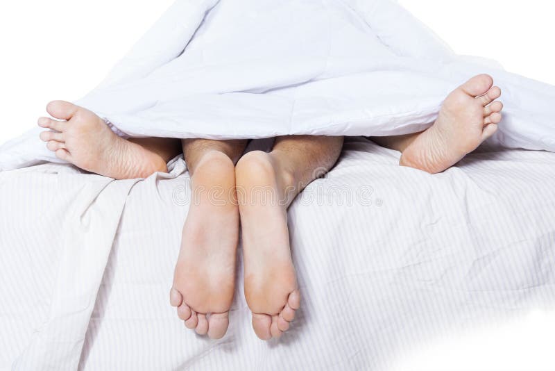 Close Up Of Couple Feet In Bed Stock Image Image Of
