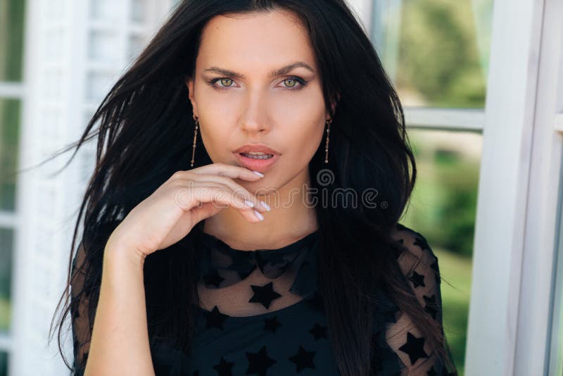 Close Up Of A Cropped Frame Of A Young Beautiful Girl With A Smooth Smooth Skin Posing Outside 