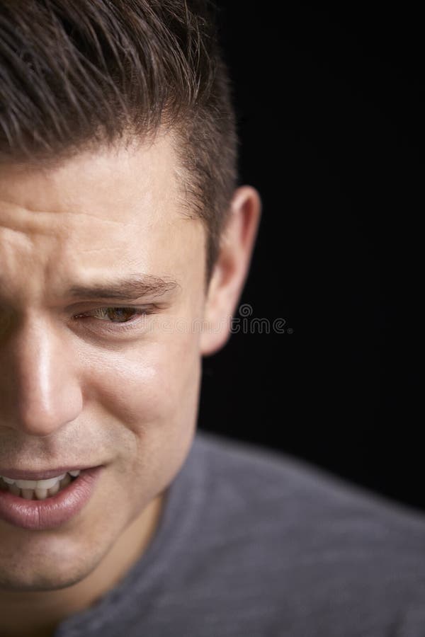 Close Up of Crying Young White Man Looking Down, Horizontal Stock Image ...