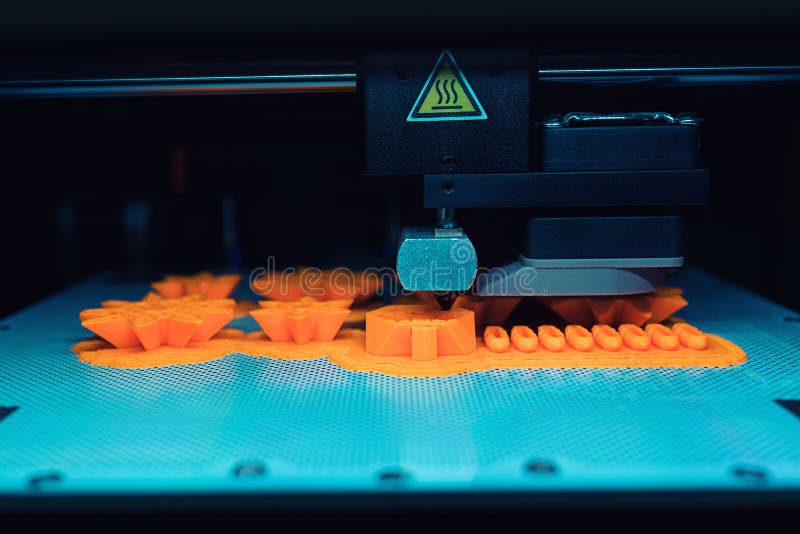 Close Up of 3D printer while printing a three dimensional prototype object stock images